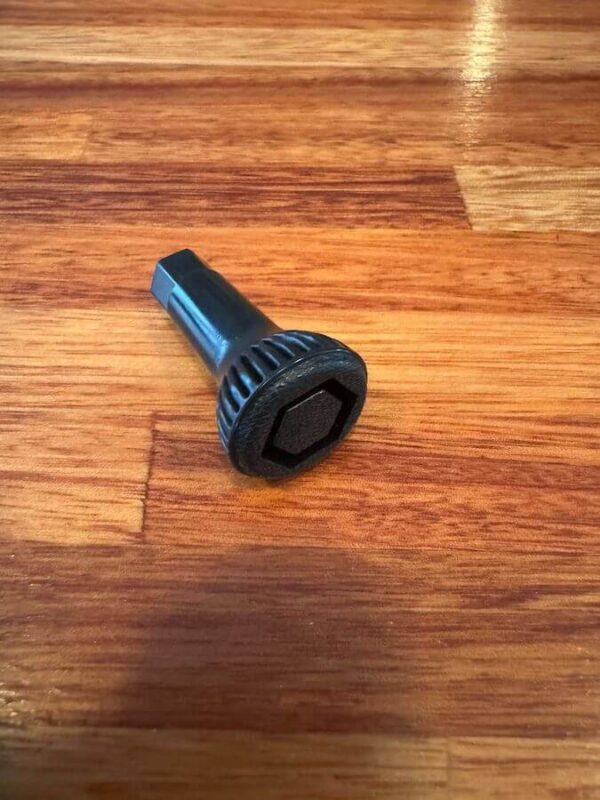 Handbrake on floor adjuster knob